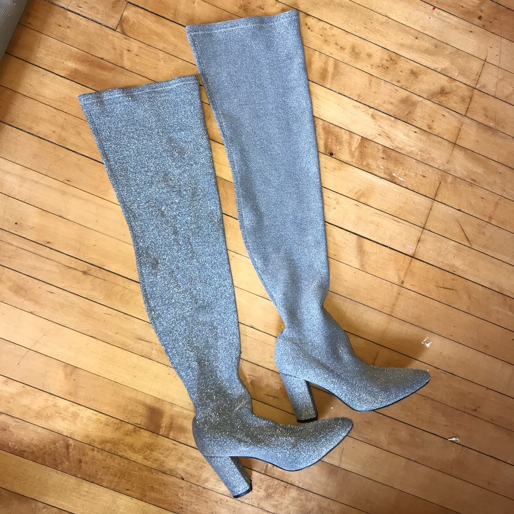 Shiny thigh high boots